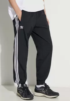 adidas Originals pantaloni Adicolor Woven Firebird Track Top barbati, culoarea negru, modelator, IT2501 imagine