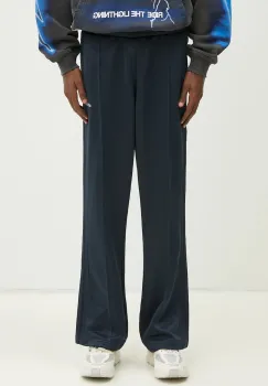 adidas Originals pantaloni de trening Flare Pant barbati, culoarea albastru marin, neted, JC8382 imagine