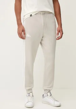 adidas pantaloni de trening Essentials culoarea bej, cu imprimeu, JE6317 imagine