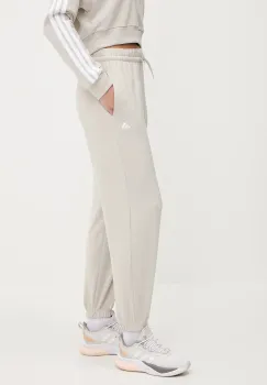 adidas pantaloni de trening Essentials culoarea bej, neted, JC8305 imagine