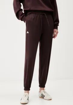 adidas pantaloni de trening Essentials culoarea maro, cu imprimeu, JX3864 imagine