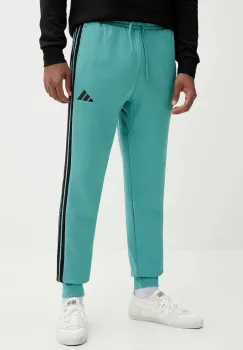 adidas pantaloni de trening Essentials culoarea turcoaz, cu imprimeu, JX0711 imagine