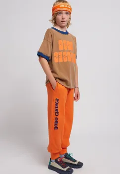 Bobo Choses pantaloni de trening din bumbac pentru copii culoarea portocaliu, cu imprimeu, 125AC140 imagine