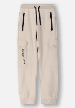 Coccodrillo pantaloni de bumbac pentru copii culoarea bej, uni, CITY RACING BOY JUNIOR imagine