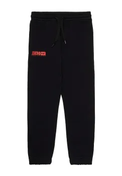 Diesel pantaloni de trening din bumbac pentru copii PBASEL TROUSERS culoarea negru, neted, J02316 imagine