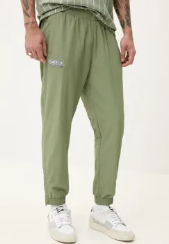 Karl Kani pantaloni de trening barbati, culoarea verde, cu imprimeu, 60060039 imagine