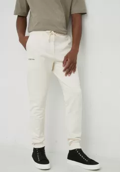 Les Deux pantaloni de trening din bumbac culoarea bej, cu imprimeu imagine