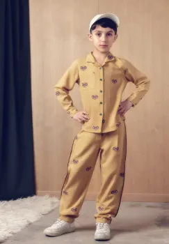 Mini Rodini pantaloni copii E.T. culoarea galben, cu imprimeu, 25830115 imagine