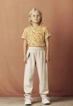 Mini Rodini pantaloni de trening din bumbac pentru copii Bird culoarea bej, cu imprimeu, 2563011111 imagine