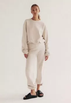 MUUV. pantaloni de trening culoarea bej, neted imagine