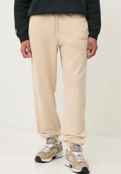 Pangaia pantaloni de trening din bumbac culoarea bej, neted imagine