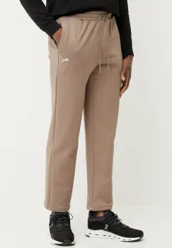 Puma pantaloni de trening din bumbac barbati, culoarea maro, neted, 629651 imagine