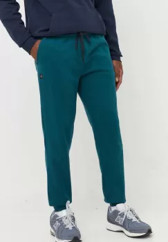 Rip Curl pantaloni de trening barbati, culoarea verde, neted imagine