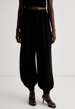Rotate pantaloni pentru femei imagine