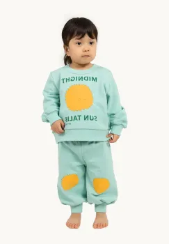 Tinycottons pantaloni de trening din bumbac pentru bebelusi SUN TALES GRAPHIC BABY SWEATPANT culoarea verde, cu imprimeu, SS25-106 imagine