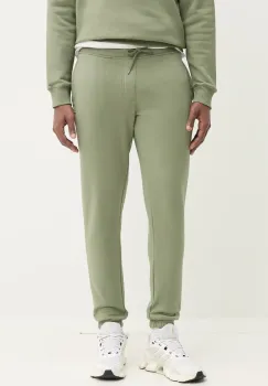 Tommy Jeans pantaloni de trening culoarea verde, neted, DM0DM20473 imagine