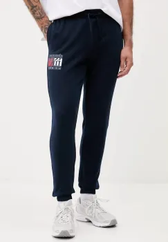 Tommy Jeans pantaloni de trening din bumbac culoarea albastru marin, cu imprimeu, DM0DM22094 imagine