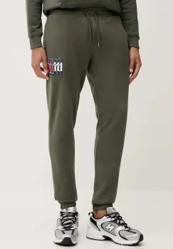 Tommy Jeans pantaloni de trening din bumbac culoarea verde, cu imprimeu, DM0DM22094 imagine