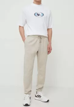 Under Armour pantaloni de trening culoarea bej, neted imagine