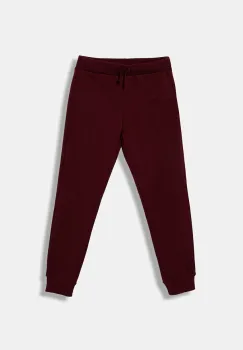 United Colors of Benetton pantaloni de trening din bumbac pentru copii culoarea bordo, uni, 3J68CF01P imagine