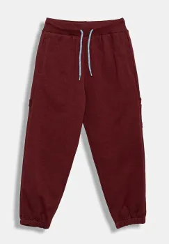 United Colors of Benetton pantaloni de trening din bumbac pentru copii culoarea bordo, uni, 3J68CF06L imagine