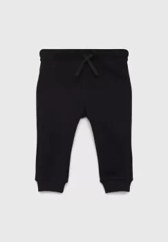 United Colors of Benetton pantaloni de trening din bumbac pentru copii culoarea negru, neted imagine