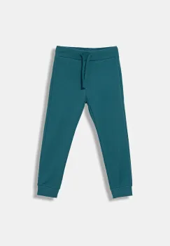 United Colors of Benetton pantaloni de trening din bumbac pentru copii culoarea turcoaz, uni, 3J68CF01P imagine