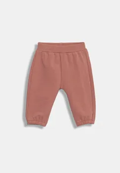 United Colors of Benetton pantaloni de trening pentru bebelusi culoarea portocaliu, cu imprimeu, 3MDSAF029 imagine