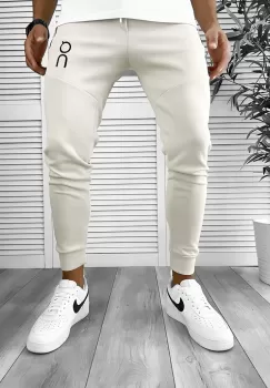 Pantaloni de trening bej conici 12260 imagine