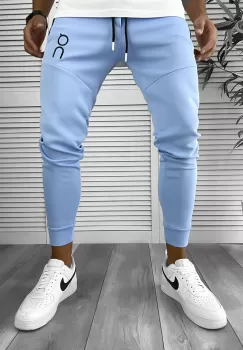 Pantaloni de trening bleu conici 12260 imagine