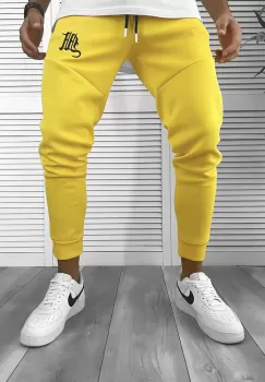 Pantaloni de trening galbeni silon conici 12376 imagine