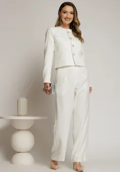 Pantaloni albi cu croi larg si inchidere cu nasturi imagine