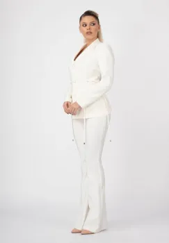 Pantaloni evazati albi imagine