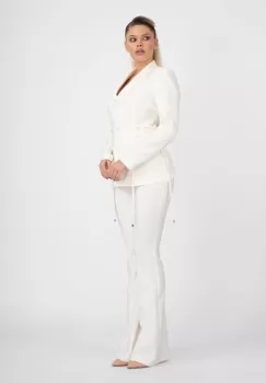 Pantaloni evazati albi imagine