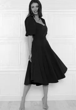 Rochie eleganta neagra din material vaporos cu croi in clos si buzunare laterale imagine