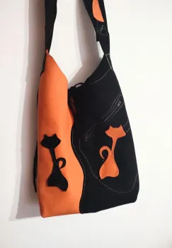 Geanta sac ,din piele naturala  intoarsa portocalie si neagra ,cu pisicute imagine