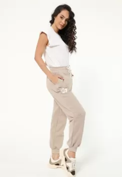 Pantaloni din bumbac bej, casual, cu floricica imagine